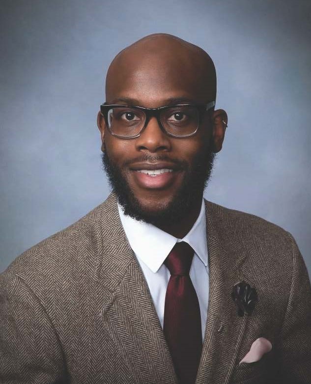 Portrait of Dr. Onoyom Onyile, a pediatric dentist with Children's Dental Center of Central Iowa in Urbandale, IA